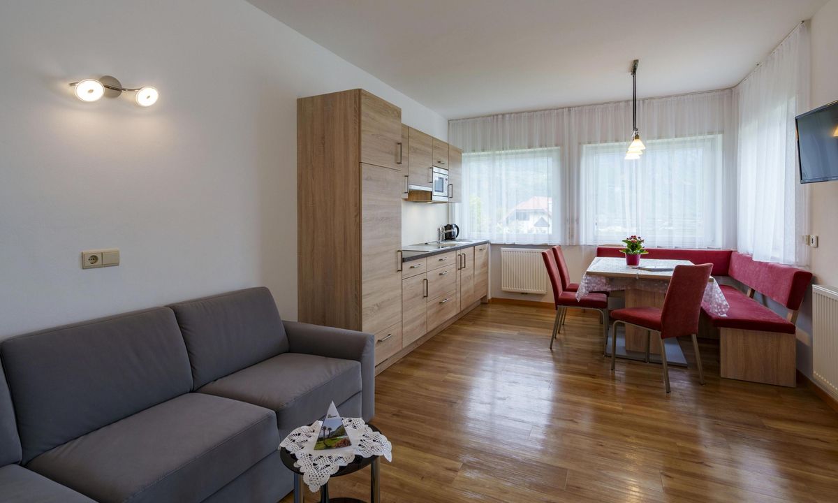 Moderne Ferienwohnung mit Küche und Essbereich im Wieserhof Andrian, Südtirol