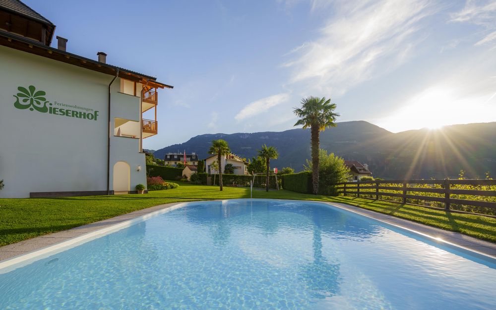 Holiday apartments Wieserhof with pool, sunbathing lawn and garden in Andrian, South Tyrol