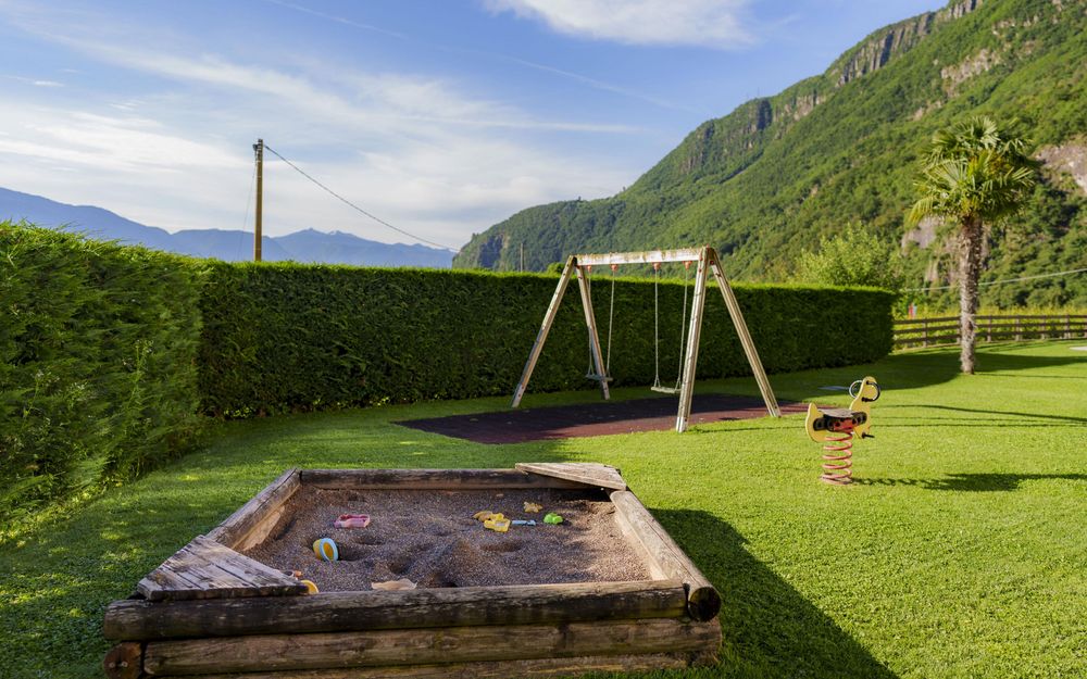 Family-friendly holiday apartment with garden, playground, swing, and sandbox at Wieserhof in Andrian, South Tyrol Wine Road
